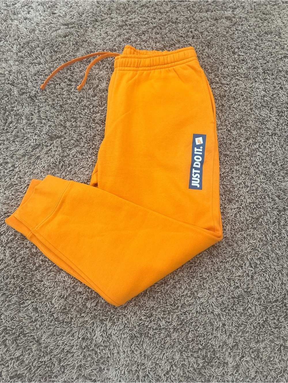 Nike Men’s Orange Fleece 'Just Do It.' Joggers